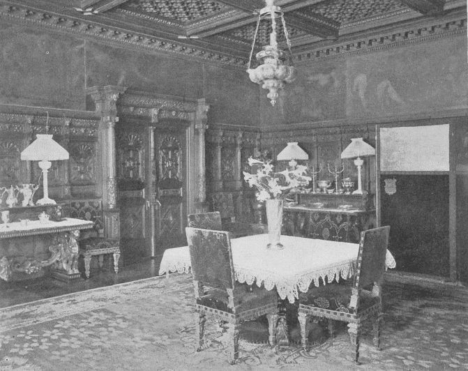 DINING-ROOM IN NEW YORK HOME SHOWING CARVED WAINSCOTTING
AND PAINTED FRIEZE