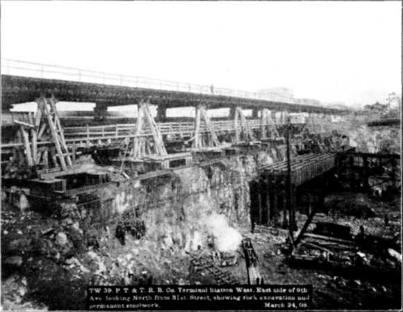 Plate XLVIII, Fig. 2.— TW 39, P.T. & T.R.R. Co. Terminal Station West. East side of 9th Ave. looking North from 31st Street, showing rock excavation and permanent steel work. March 24, 08.