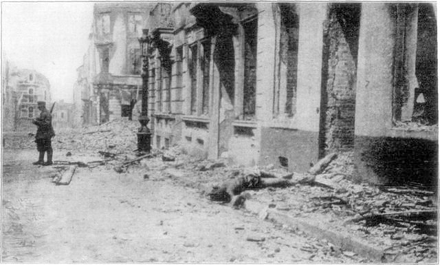 The dead and the living. A Belgian civilian and a German soldier