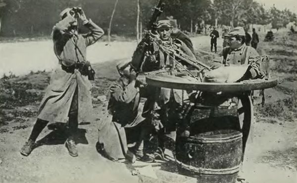 French Using an Ordinary Wine Barrel on which a Wagon
Wheel Is Mounted to Facilitate the Revolving Movement to Any Desired
Direction