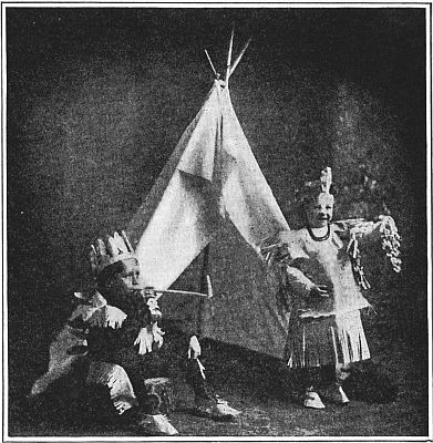 Fig. 169—Look at our newspaper Indian costumes. We are playing Indians.