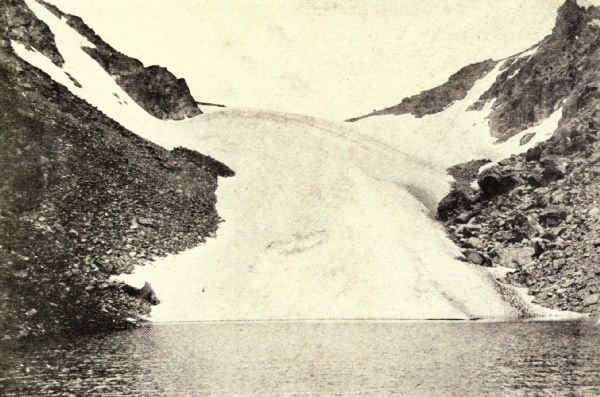 THE ANDREWS GLACIER HANGS FROM THE CONTINENTAL DIVIDE